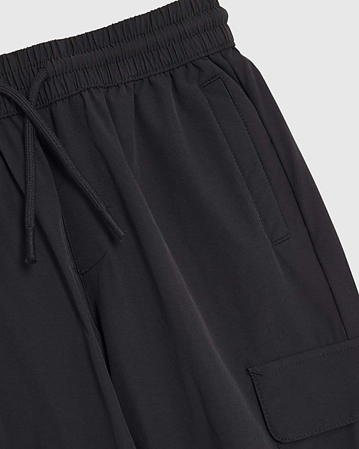ragazzi nero zip pantaloni cargo