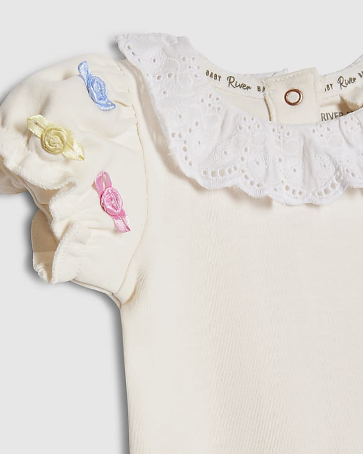 bambine crema rosetta body set