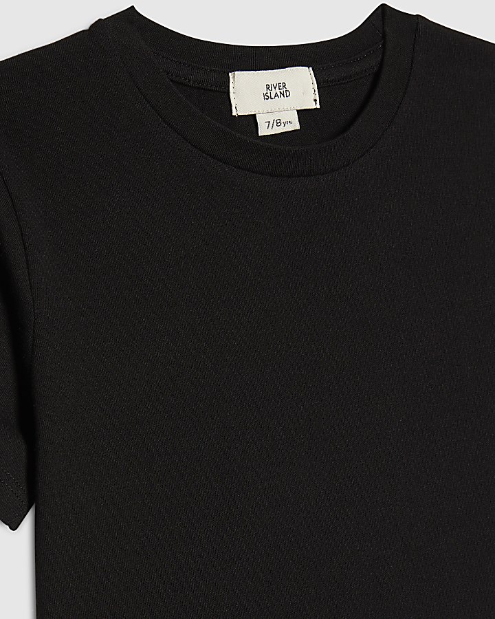 ragazze t-shirt nera e skort set