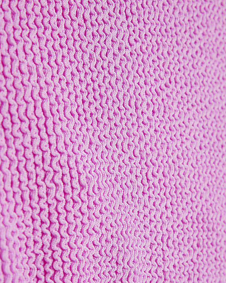 ragazze viola a blocchi di colore con texture costume da bagno