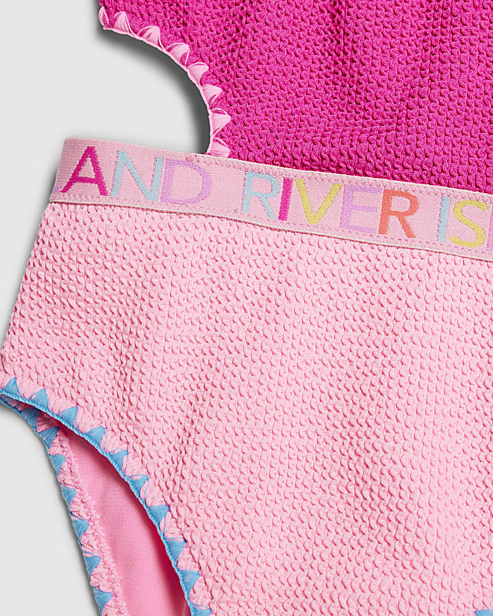 ragazze rosa con texture asimmetrica costume da bagno