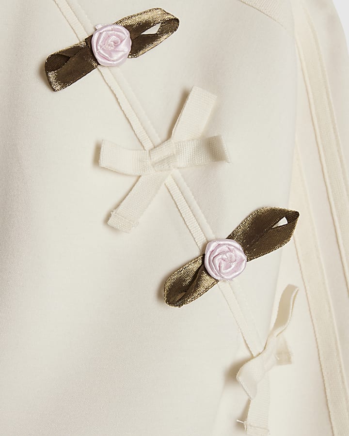 ragazze crema rosetta tuta set