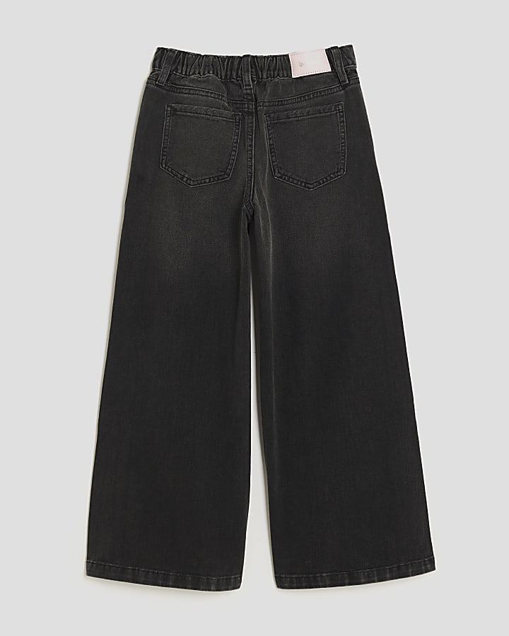 ragazze nere tirare jeans a gamba larga