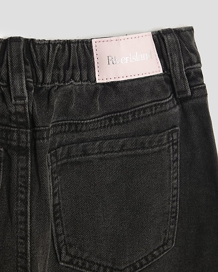 ragazze nere tirare jeans a gamba larga