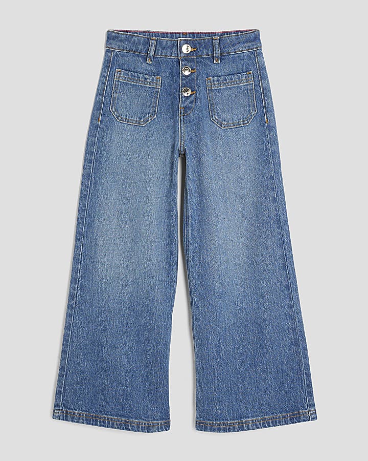 ragazze in gamba larga tasca anteriore dei jeans