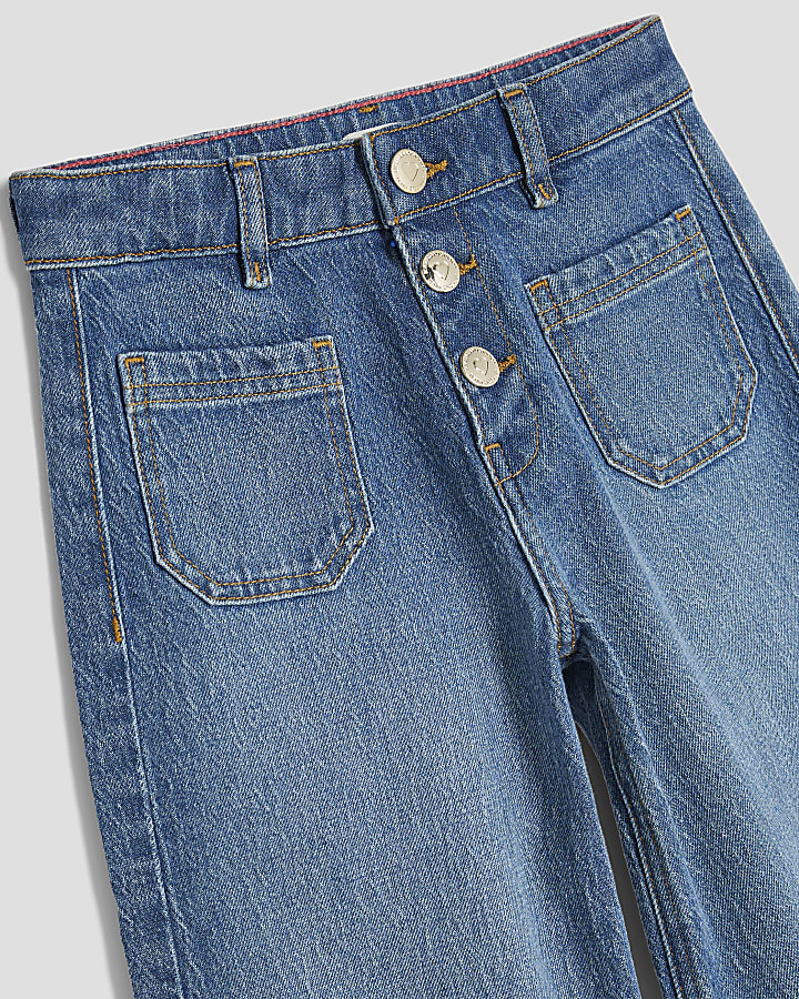 ragazze in gamba larga tasca anteriore dei jeans