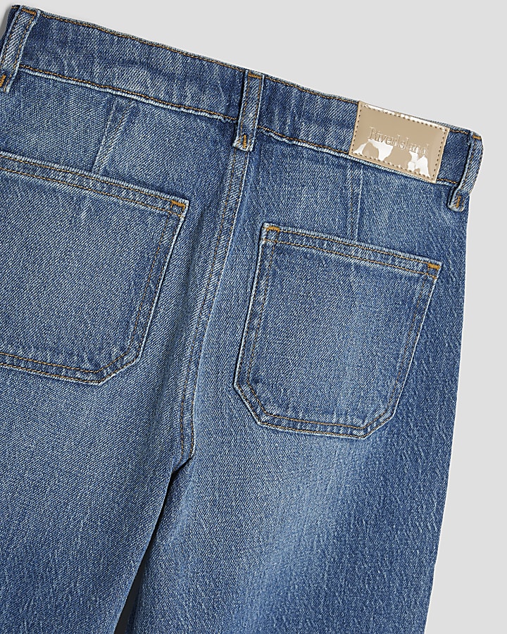 ragazze in gamba larga tasca anteriore dei jeans