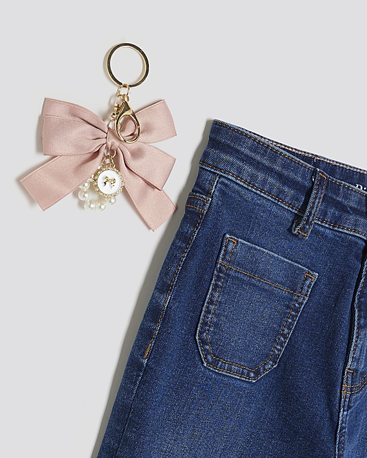 ragazze fiocco blu portachiavi jeans svasati