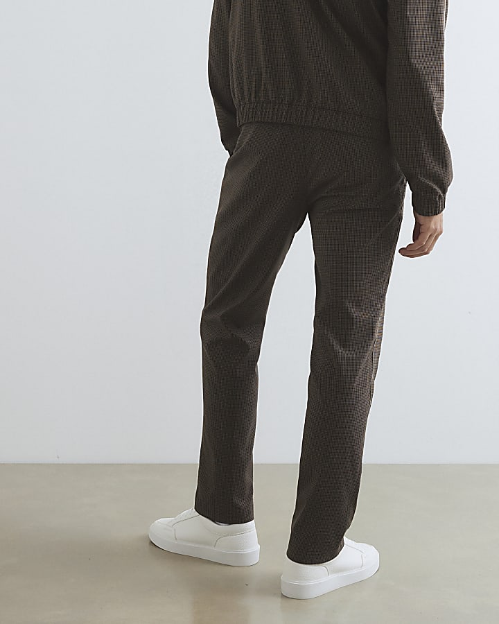 marrone slim fit puppytooth di sottofondo pantaloni