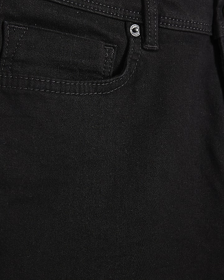 spray nero su jeans