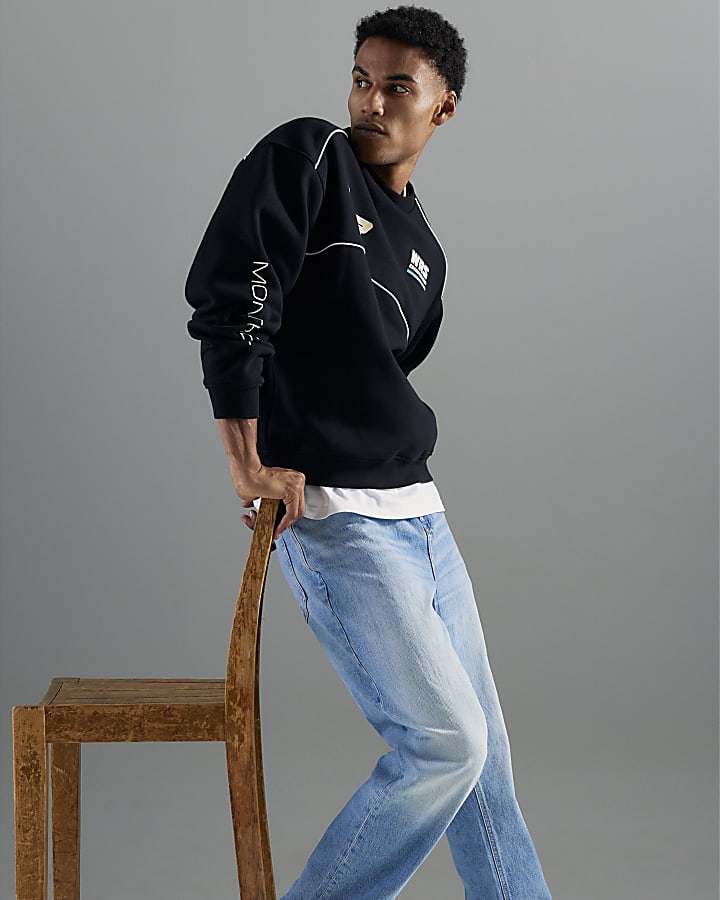 blu denim gamba a tubo mid wash jeans