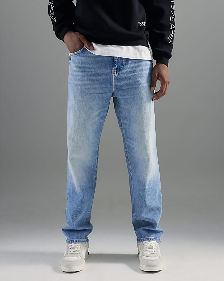 blu denim gamba a tubo mid wash jeans