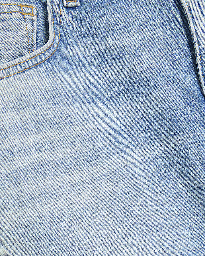 blu denim gamba a tubo mid wash jeans