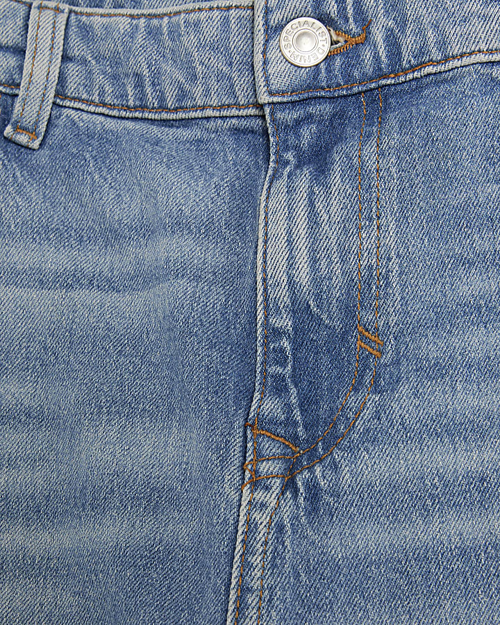 blu denim gamba a tubo mid wash jeans