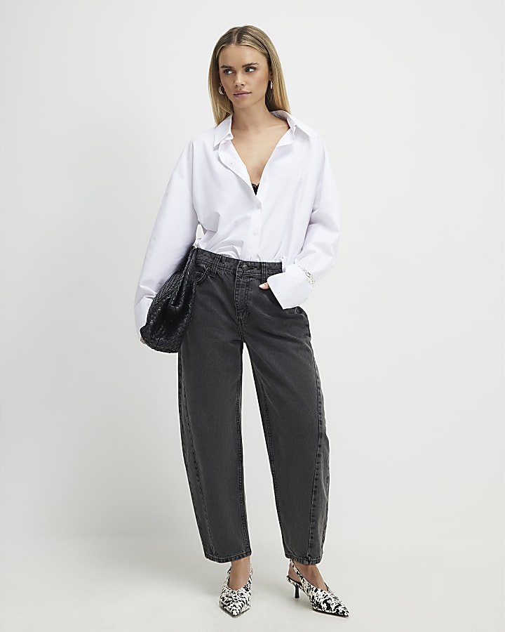 petite nero cucito a botte jeans a gamba
