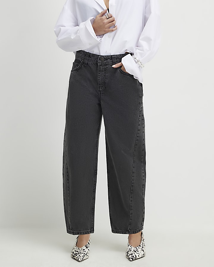 petite nero cucito a botte jeans a gamba
