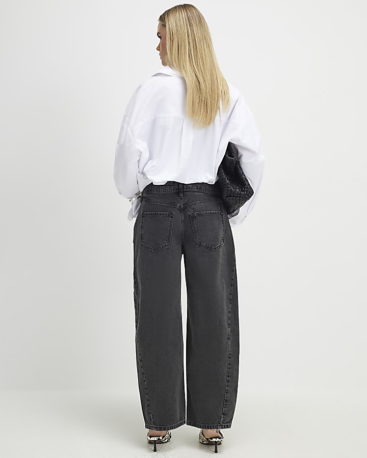 petite nero cucito a botte jeans a gamba
