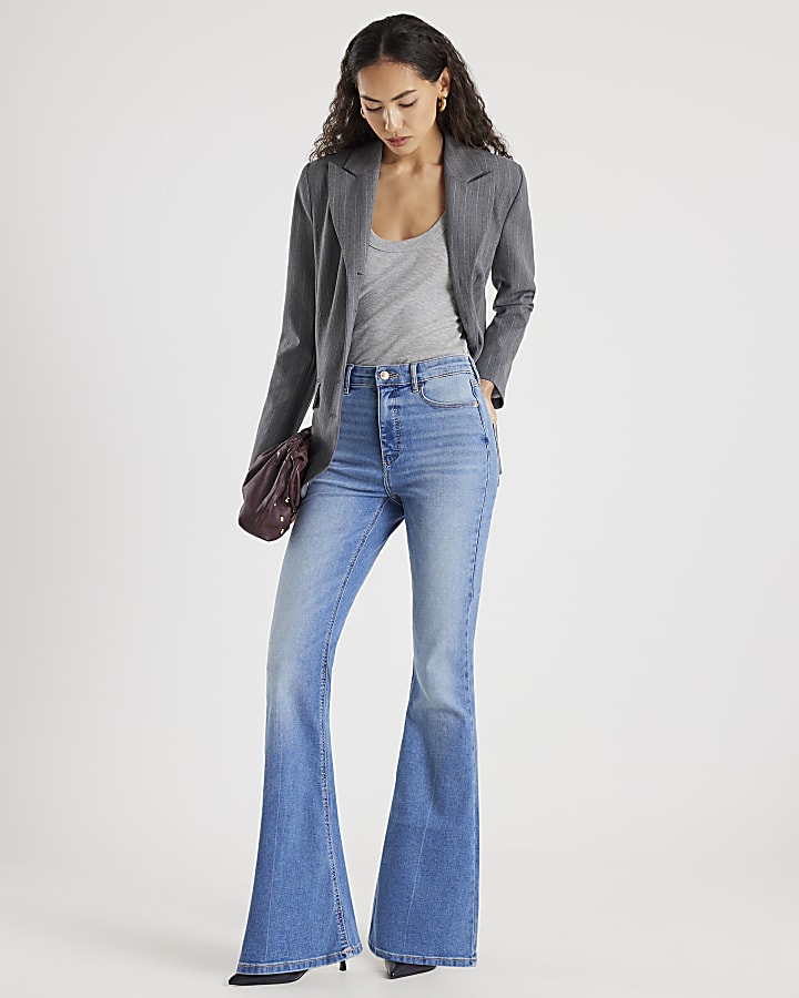 blu a vita alta scolpire jeans svasati