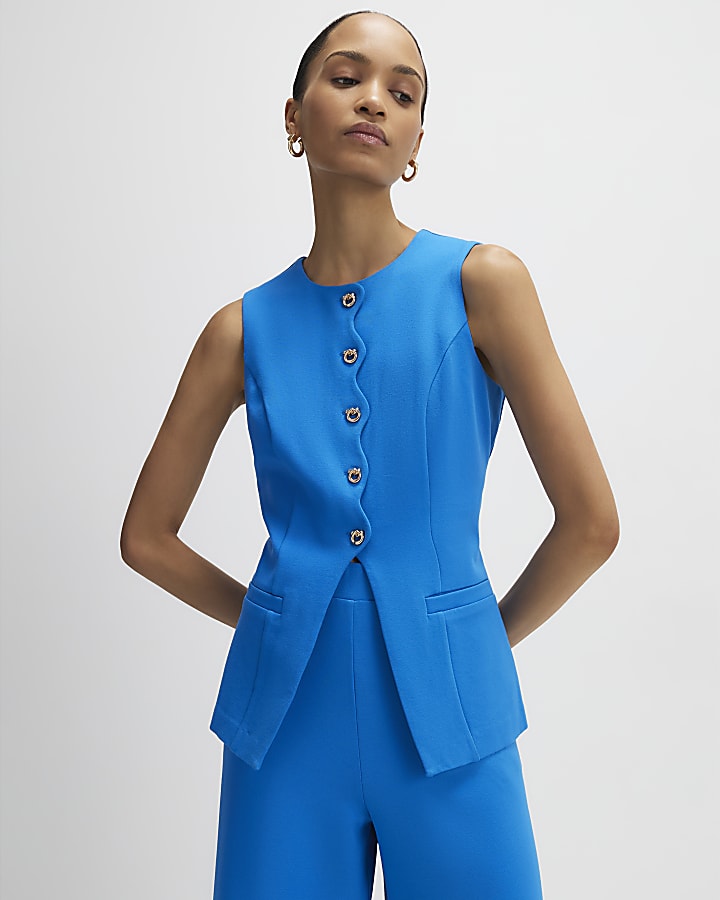 blu tratto di capesante trim gilet su misura