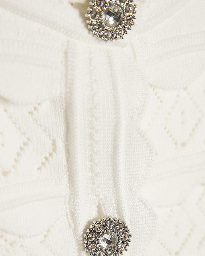 bianco pettine trim diamante pulsante cardigan