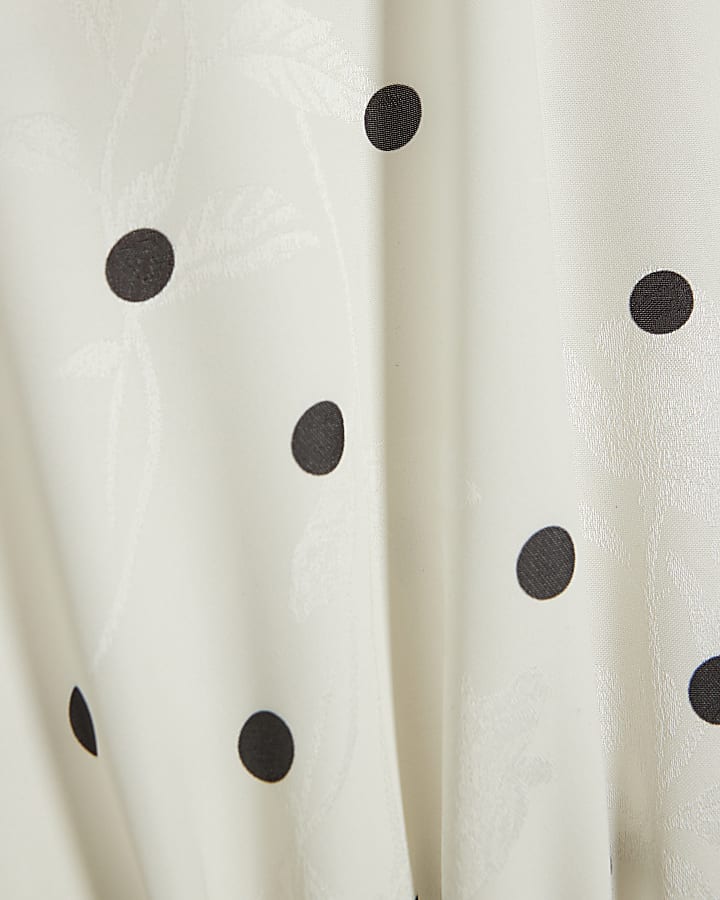 crema a pois collo cavezza tuta