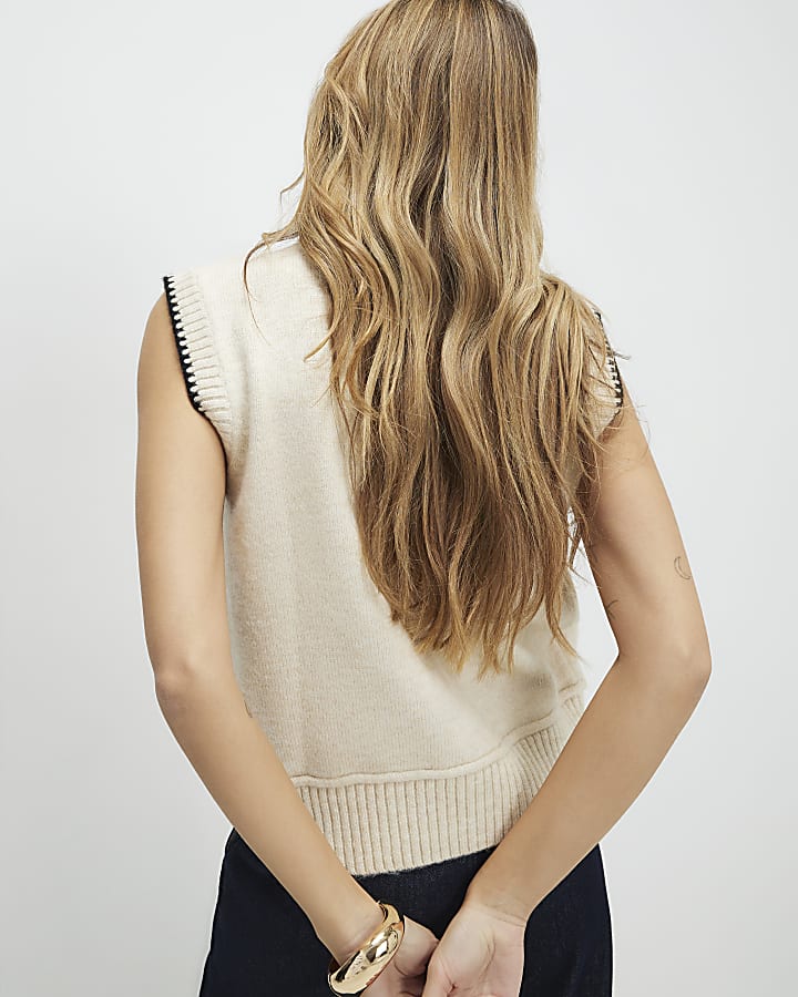 crema cravatta in maglia collo gilet