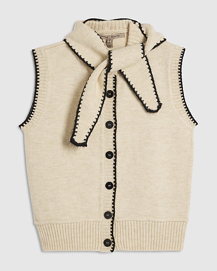 crema cravatta in maglia collo gilet