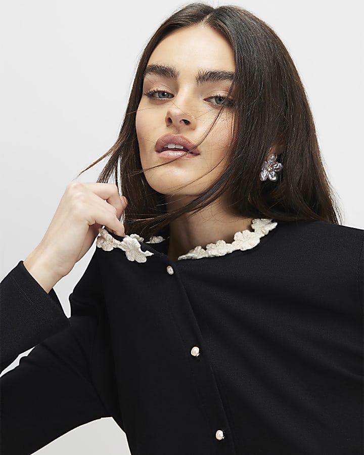 nero manica lunga fiore trim top