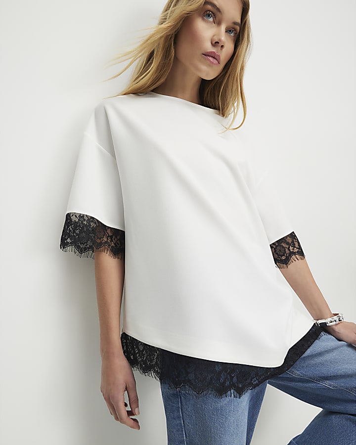 crema manica corta in pizzo asimmetrica top