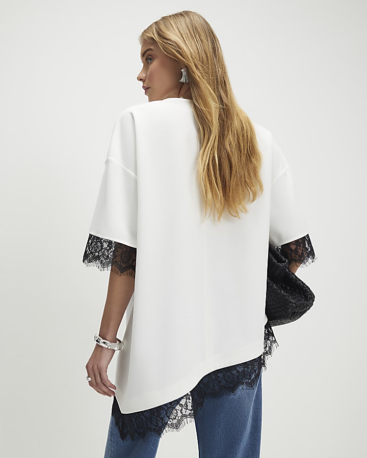 crema manica corta in pizzo asimmetrica top