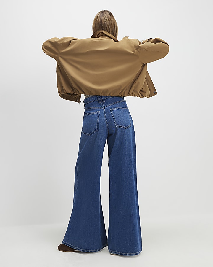 blu a vita alta zip frontale jeans a gamba larga