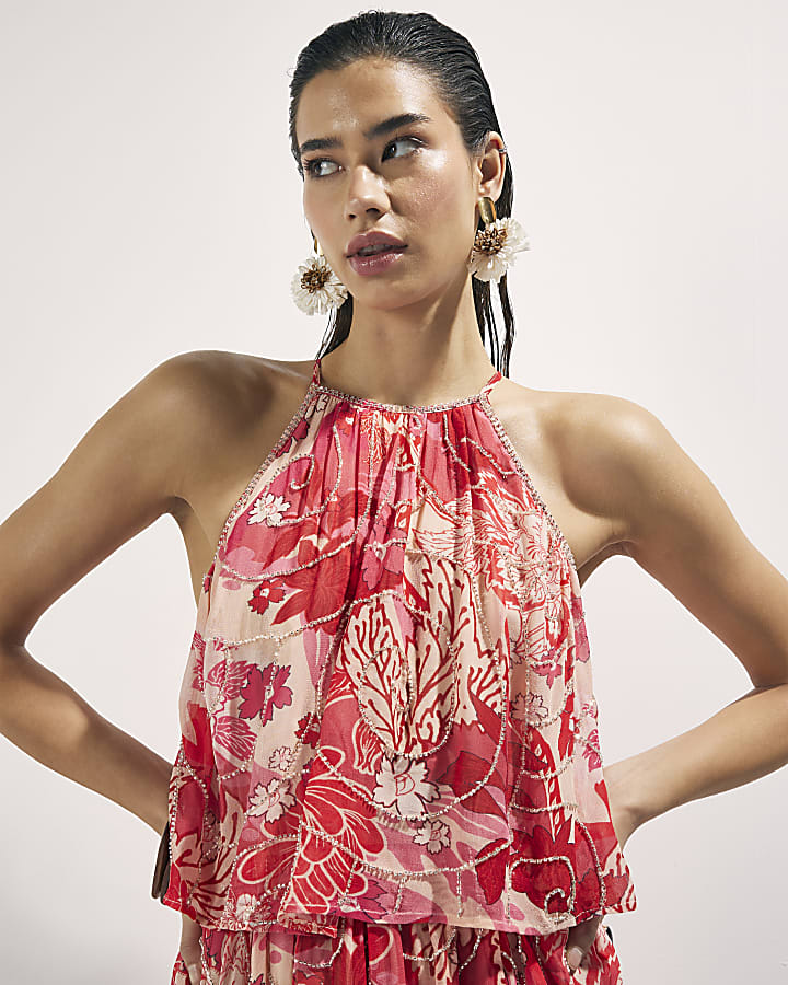 rosso floreale impreziosito tutina