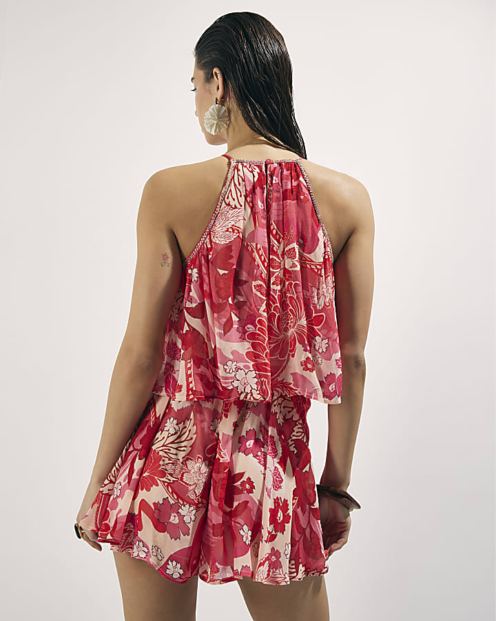 rosso floreale impreziosito tutina